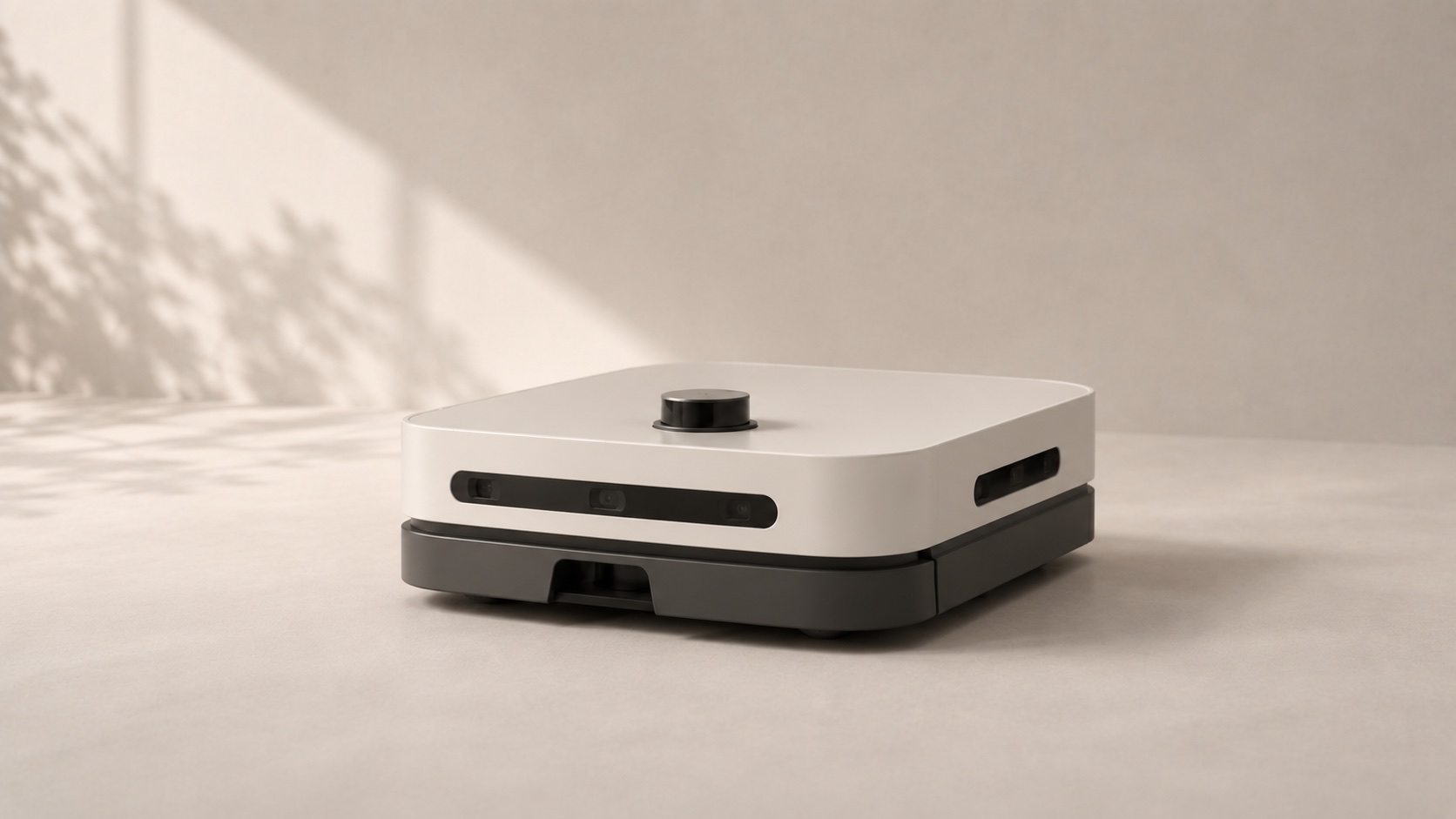 A low-profile autonomous mobile robot with integrated sensors.